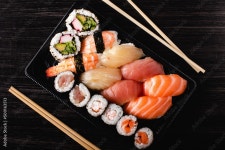 Sushi to go concept. Takeaway box with sushi Stock Photo | Adobe Stock Sushi to go concept. Takeaway box with sushi Stock Photo