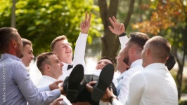 Slow motion. Bottom view. Stock 비디오 | Adobe Stock Groomsmen toss groom in the air. Man flexing and having fun with best... 