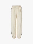 15 Tunic and Trouser Outfits for Effortless Spring Style | Vogue Shop 15 Tunic-Trouser Pairings for Effortless Spring Style 