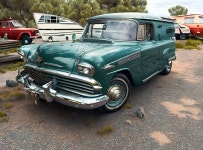 Vintage Green Car with Chrome Detailing in Gravel Lot with Classic Caravans | Deep Dream Generator atompunk, rv park | Deep Dream... 