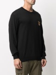 Shop black Moschino bear-motif crew-neck jumper with Afterpay - Farfetch Australia Moschino bear-motif crew-neck Jumper - Farfetch
