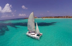 Isla Mujeres: Catamaran with Open Bar, Snorkeling and Lunch | GetYourGuide