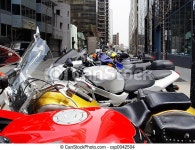 Bikes in a row. A row of colorful motorcycles in montreal. | CanStock