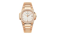 Patek Philippe Nautilus 7010/1R Date & Silvery Opaline Dial... for $90,000 for sale from a Seller on Chrono24