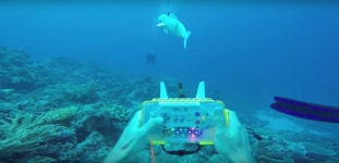 Watch: Robot Swims Like a Real Fish Using Super Nintendo Controller - Newsweek Watch Super NES Controller Move Robot Fish