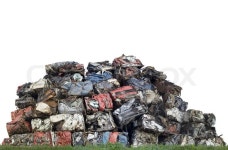 Compressed stacked cars with space for ... | Stock image | Colourbox