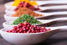 Assorted powder spices in wooden spoons ... | Stock image | Colourbox