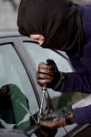 A male car thief | Stock image | Colourbox