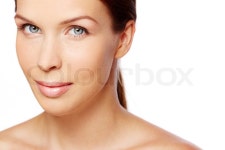 Face of charming woman looking at ... | Stock image | Colourbox