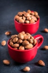 Fried almonds in the cups,selective ... | Stock image | Colourbox