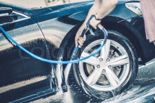 Self Car Washing. Cleaning Wheels Using ... | Stock image | Colourbox