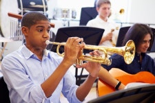 Male Pupil Playing Trumpet In High ... | Stock image | Colourbox