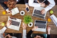 Business colleagues with modern gadgets ... | Stock image | Colourbox