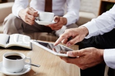 Businessman pointing at screen of ... | Stock image | Colourbox