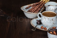 Cup of coffee and bread sticks, ... | Stock image | Colourbox