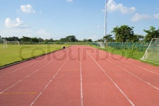 Empty outdoor racetrack with blue sky | Stock image | Colourbox