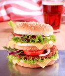 Double cheeseburger and a glass of soda | Stock image | Colourbox