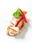 Slice of bread with prosciutto | Stock image | Colourbox