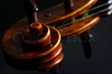 The view of a violin head on black ... | Stock image | Colourbox