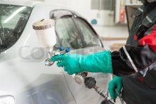 Spray gun with paint for painting a car ... | Stock image | Colourbox