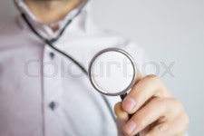 Businessman with stethoscope | Stock image | Colourbox