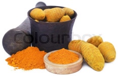 Whole and ground turmeric in bowl with ... | Stock image | Colourbox
