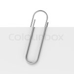 Metal paper clip isolated on a white ... | Stock image | Colourbox