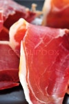 Closeup of a pile of spanish serrano ... | Stock image | Colourbox
