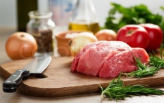 Raw beef on cutting board | Stock image | Colourbox
