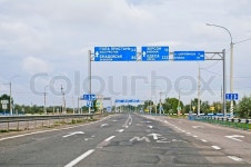 Multilane highway car c pointers towns ... | Stock image | Colourbox
