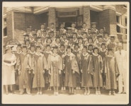 [Graduating class standing in front of the First Baptist Church] - Side: 1 of 2 . Magnified. UNT Digital Library [Graduating... 
