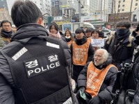 “함께 조사받겠다” 전장연 10여명 ‘합동 출석’…조사는 2명만｜동아일보 “함께 조사받겠다” 전장연 10여명 ‘합동 출석’…조사는 2명만