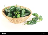 fresh green Pimientos in a bowl Stock Photo - Alamy