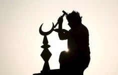 Australian men charged with terrorism over mosque fires By Reuters