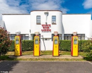 Art Deco flat for sale has a Grade II listed garage façade and four Shell petrol pumps | Daily Mail Online This flat for sale... 