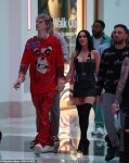 Megan Fox puts on a busty display in sexy LBD as she holds hands with fiance Machine Gun Kelly | Daily Mail Online Megan Fox puts... 