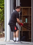Im A Celebs Ant McPartlin shows off his muscles in a tight black gym top as he breaks a sweat during a gruelling workout in... 