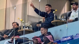 Cristiano Ronaldo salutes fans as he watches Al-Nassr's 4-4 draw with Al-Hazm from the stands while serving one-game ban for... 