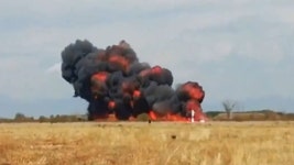Horrifying moment jet crashes in huge fireball killing top pilots after failed loop-the-loop stunt | Daily Mail Online Jet... 