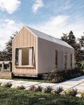 The spacious interior of our tiny house design “Uno” has everything you need on one level! A generous kitchen, a couch with a... 