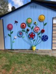 Hub cap art on the side of my lake house outdoor kitchen | Bahçe sanatı, Tasarım, Saksı