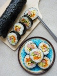 Korean Rice Roll | Kim bap 김밥 Korean Seaweed Rice Roll (Kim Bap 김밥) - Tasvel. | Recipe | Korean street food recipes, Food... 