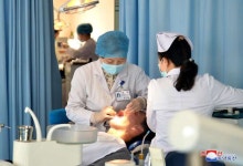 환자치료에 정성을 - 류경치과병원에서 - At Ryugyong Dental Hospital - in 2021 | Captain hat, Captain, Hard hat