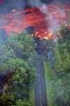 Aerial view taken 02 April 2007 of lava coming from the Piton de... and road in the Indian Ocean island of Reunion. | 화산, 여행
