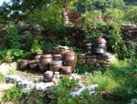 Jangdokdae (Korean: 장독대): Jars used typically for fermenting kimchi, soybeans etc. These jars are also used for storing grains.... 
