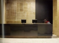 Pin page 구로철판과 샌딩우드로 만든 카운터 이미지월 _ counter image wall | Reception desk design, Lobby design, Hotel interiors