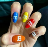 M&M candy nails | Nail art kit, Crazy nail designs, Popular nail designs