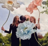 Pin by Hana Lee on 아이디어 in 2025 | Big paper flowers, Flower runner wedding, Wedding arch flowers