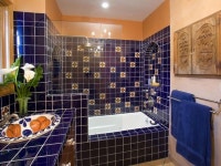 Latin flavor makes a splash in the bathroom with vibrant, handpainted tiles. Designer Erica Islas creates a traditional, Mexican... 