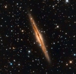Edge-on galaxy NGC 891 in the Constellation Andromeda - Sky & Telescope | 우주, 별